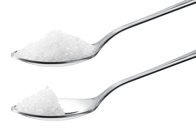 One spoon with more sugar, one spoon with less sugar