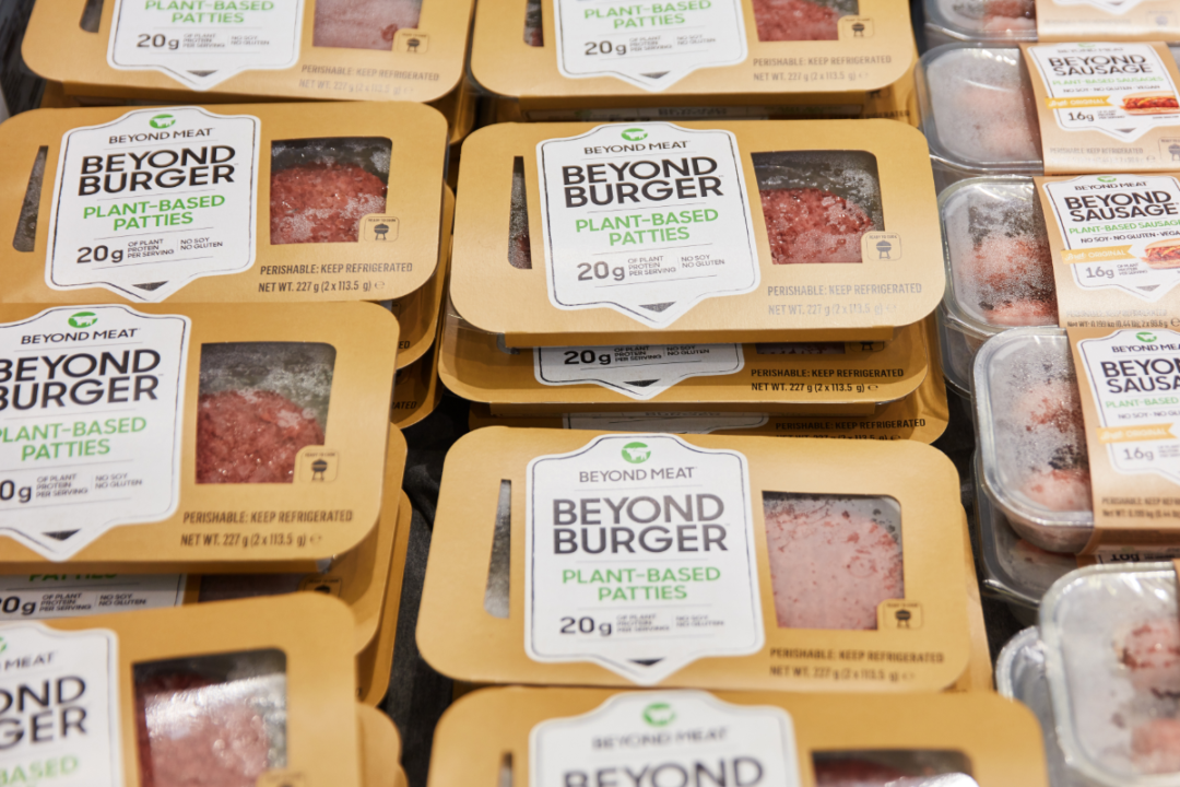 Beyond Meat burgers and sausage in grocery store freezer