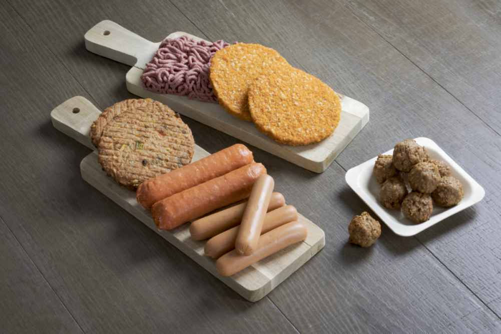 Variety of uncooked plant-based meat alternative products