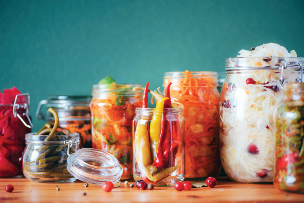 Variety of fermented foods in glass jars