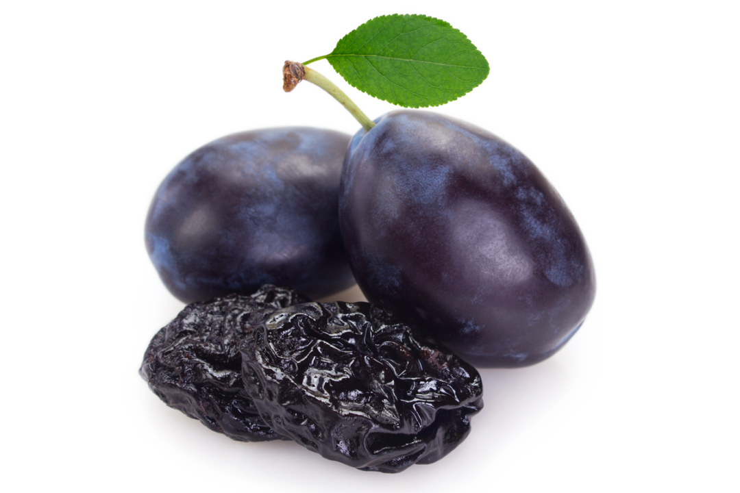 Prunes on white background
