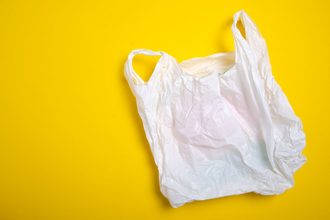 plastic-grocery-bag-on-yellow-background