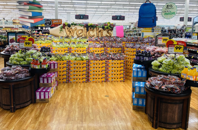 display-of-robinson-fresh-grapes-and-back-to-school-promotion-in-a-grocery-store