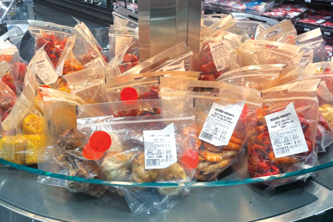 rouses-seafood-boil-kits-in-plastic-bags-at-grocery-store
