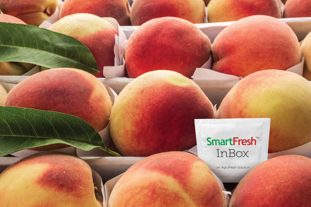 box of peaches with SmartFresh InBox tag