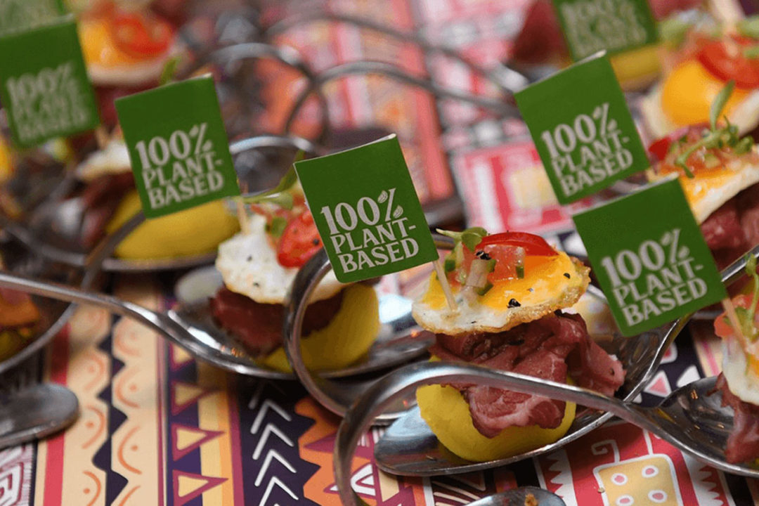 Unmeat plant-based product displayed on small silver spoons