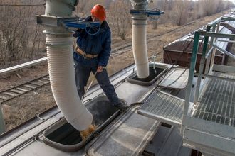 person working on a rail system