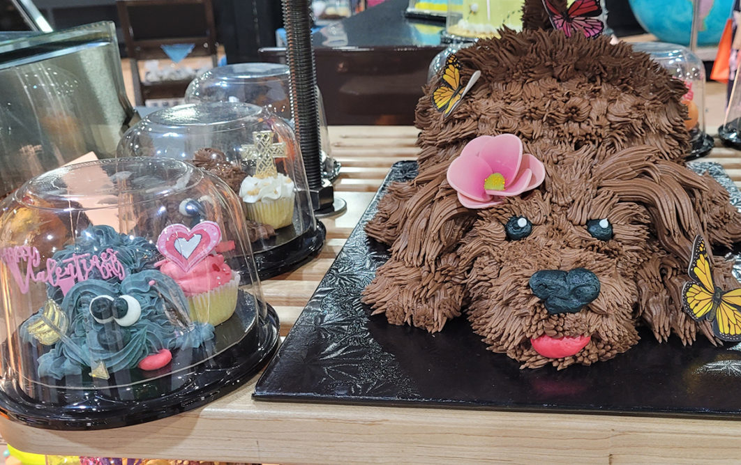 cake shaped and decorated to look like a brown dog