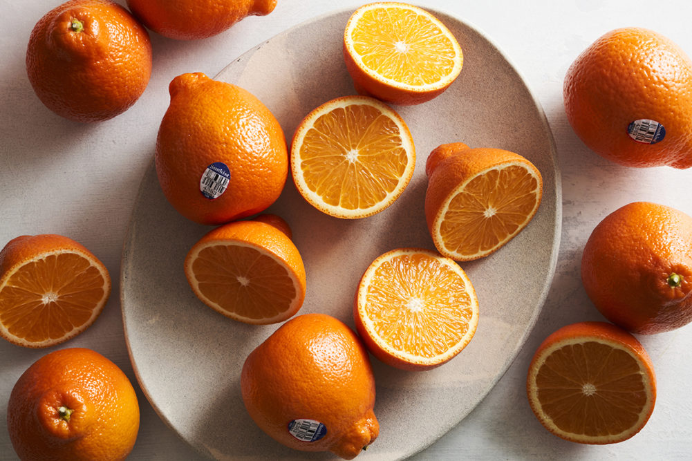 Sunkist oranges on a white background
