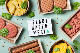 Assortment of plant based meat on a table. View from above, flat lay food.