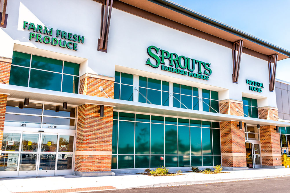 Exterior of Sprouts Farmers Market store with farm fresh produce sign on street in Virginia Fairfax County
