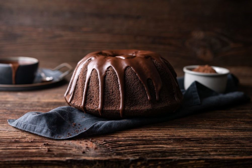 chocolate cake with chocolate icing drizzled on top