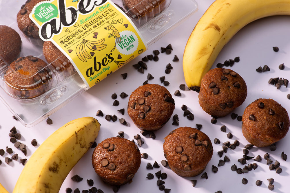 Abes chocolate chip muffins surrounded by bananas