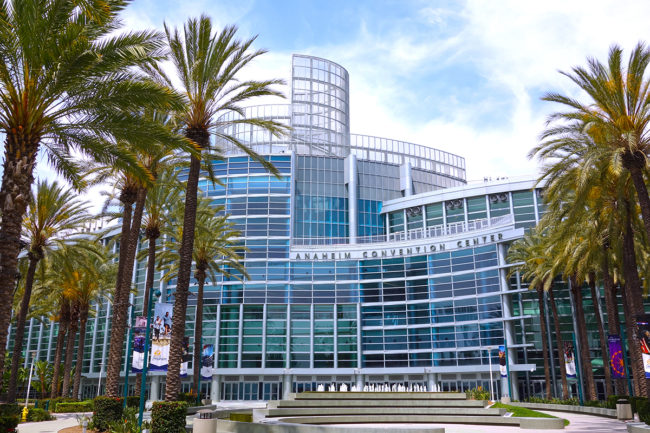 outside of the Anaheim Convention Center in California with palm trees