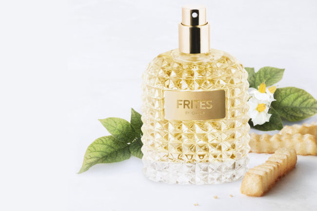 glass perfume bottle that says "fries"