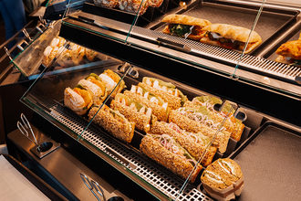 sandwiches in the grab-and-go section of a grocery store