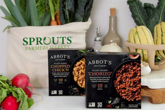 Abbots_Butcher_plant_based_Ground_Beef_and_Chopped_Chickn in packaging with a Sprouts shopping bag full of fresh produce