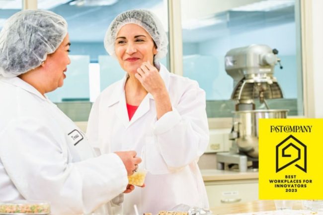 two women in a food production facility