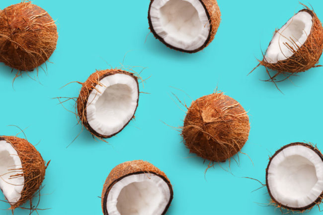 ccoconut halves on a bright blue background