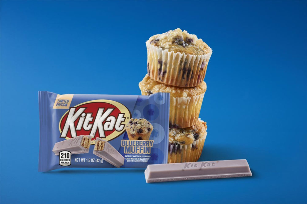 Blueberry Muffin Kit Kat package with blueberry muffins next to it