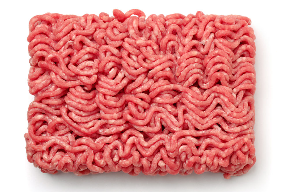 raw ground beef on a white background