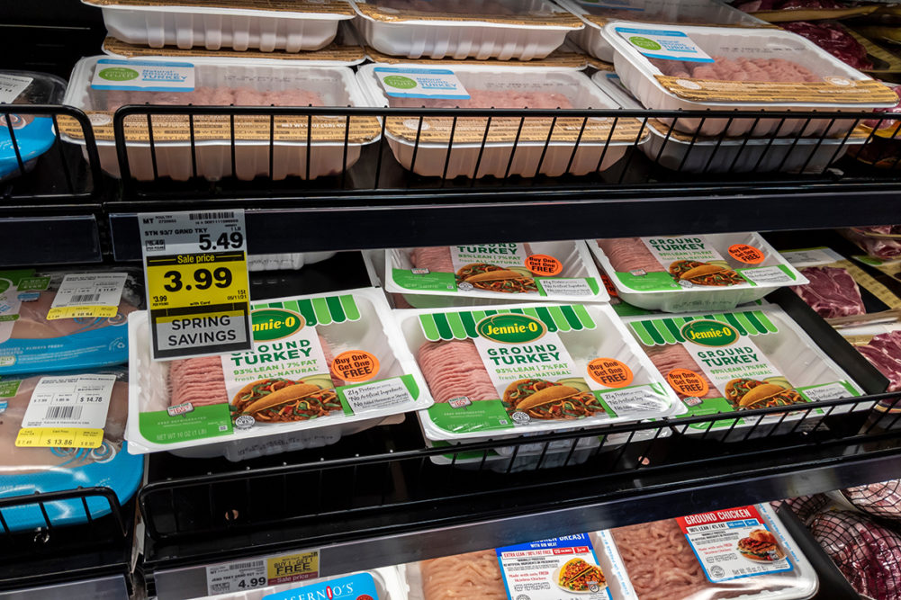 View of packaged ground turkey meat at QFC grocery during a buy one get one free sale