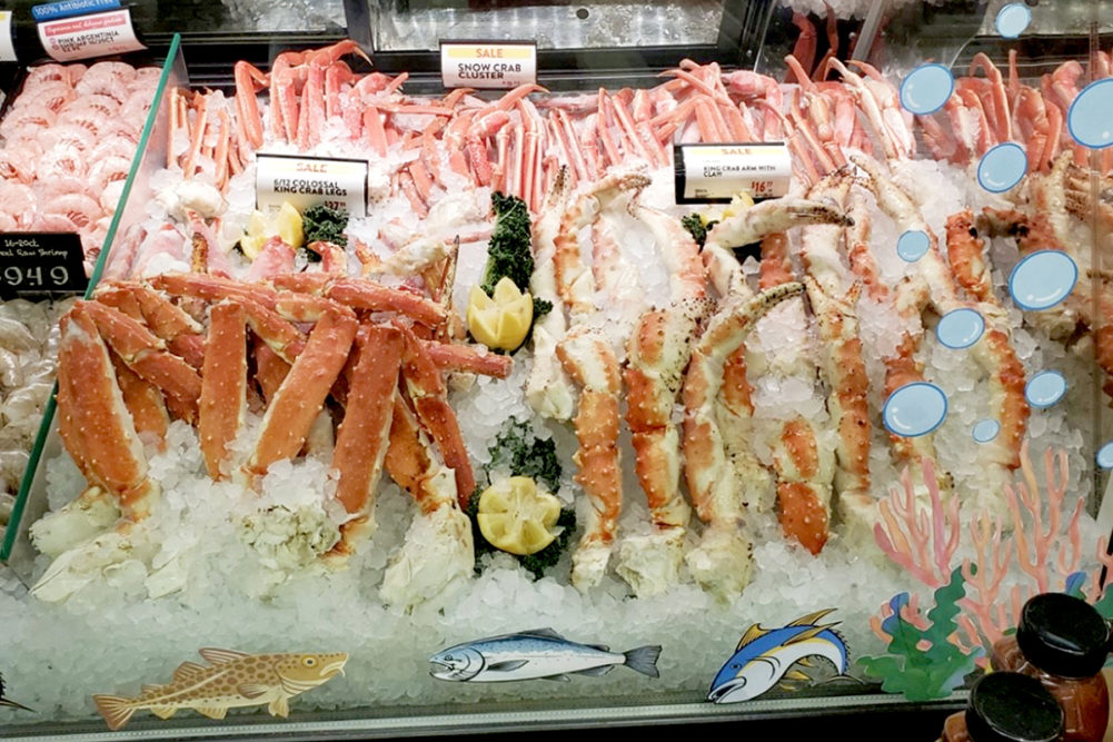 fresh seafood in a glass case