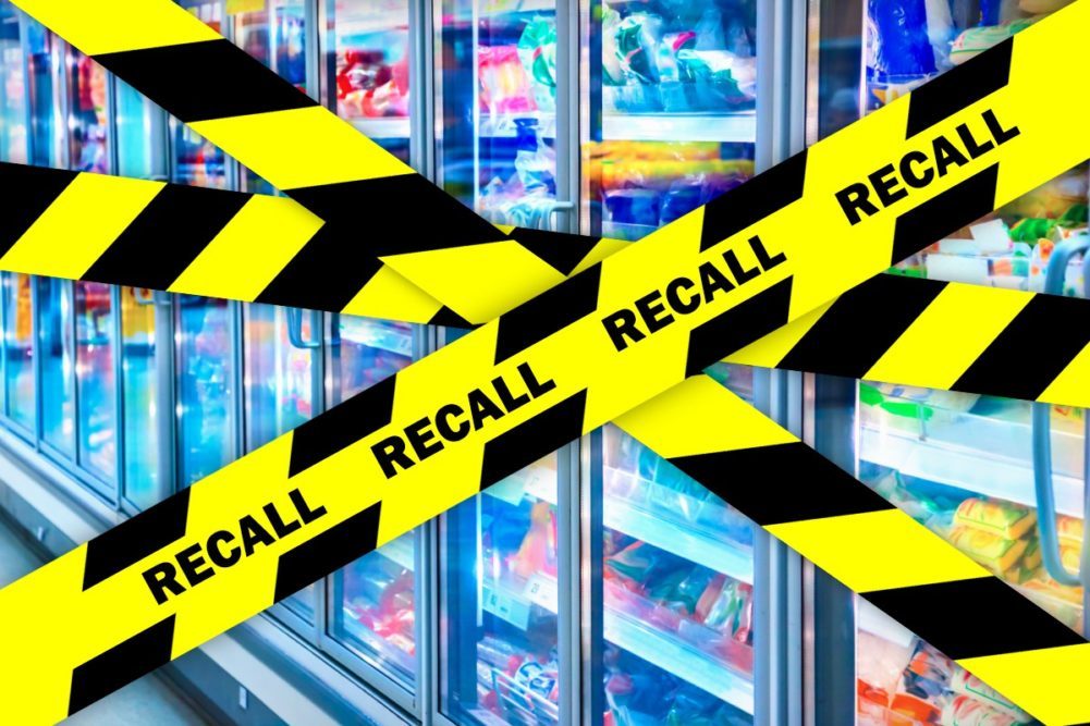 grocery store fridge with recall caution tape
