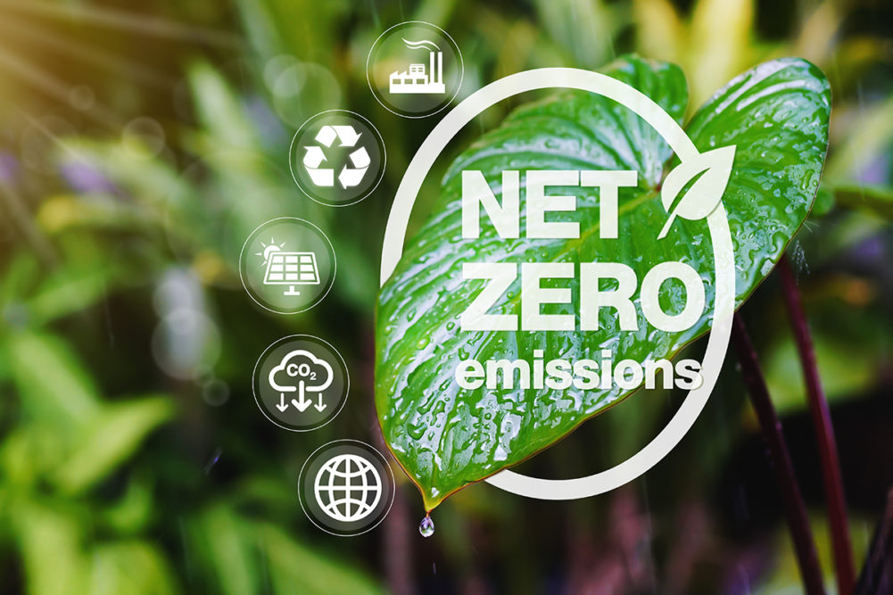 green leaf with text "net zero emissions"