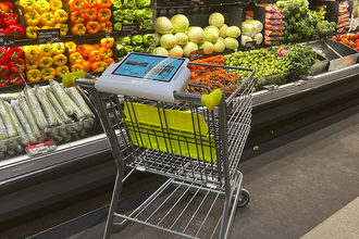 veeve device on a grocery cart in produce section