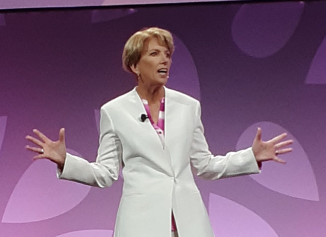 Cathy Burns speaking on a stage