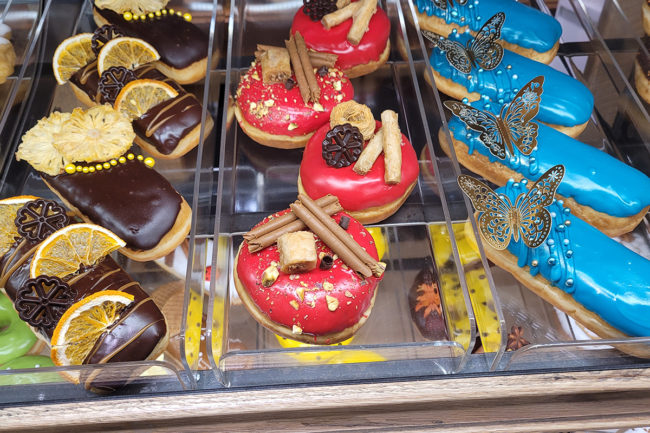 donuts with fancy icing decorations