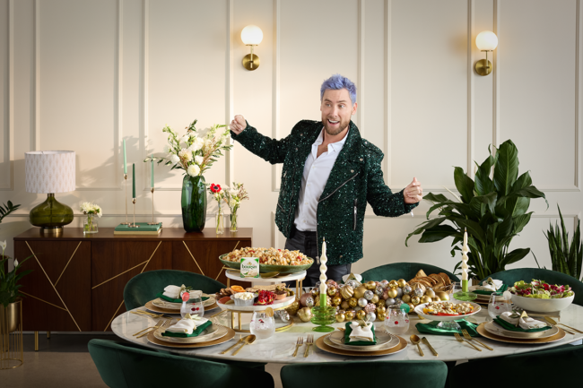 Lance Bass with a table decorated for holiday entertaining