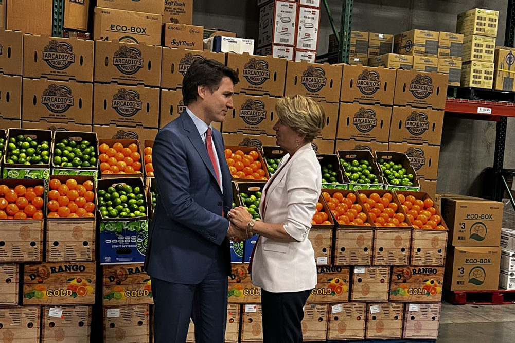Canadian Prime Minister Justin Trudeau shaking hands with Cathy Burns