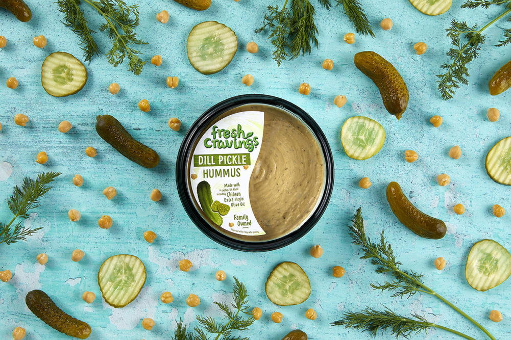 Dill Pickle Hummus on blue background