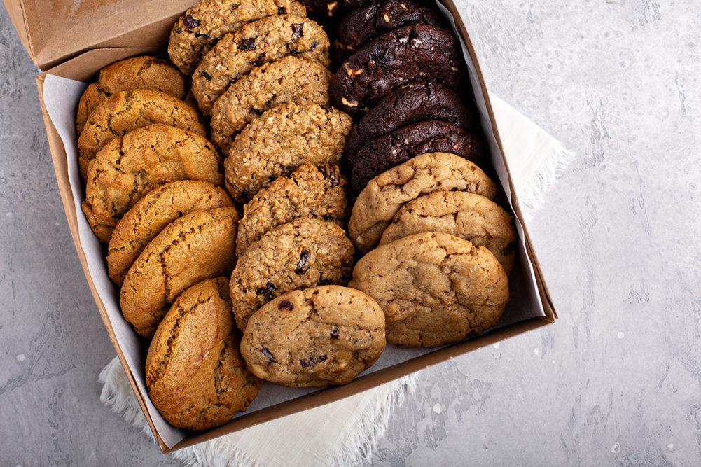 Box of assorted cookies freshly baked and packed to go