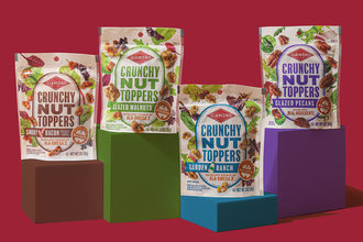 Crunchy Nut Toppers packages on red background